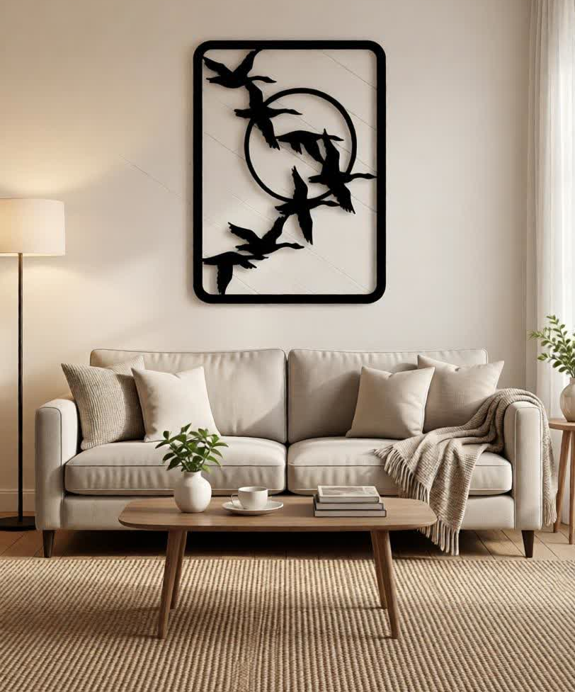 Add a sense of freedom, movement, and modern elegance to your interiors with the Flying Birds CNC Metal Wall Art. This beautifully minimal design features a graceful flock of birds in flight enclosed within a sleek geometric frame, symbolizing freedom, journey, and harmony with nature. Its clean lines and artistic balance make it a perfect statement piece for contemporary spaces. Crafted using advanced CNC laser cutting technology, each bird silhouette is precisely cut to capture natural motion and fine detailing. Made from high-quality metal and finished with a durable matte black powder coating, this wall art offers long-lasting durability while maintaining a refined, modern look. The open-frame structure allows light and shadow to interact with the wall, adding depth without overpowering the space. Whether placed in a living room, hallway, bedroom, or office, this artwork brings a calm and uplifting presence that enhances modern, minimalist, and nature-inspired interiors. Ideal for those who appreciate subtle yet meaningful décor, this CNC metal bird wall art blends simplicity with artistic expression, making it a timeless addition to any setting.