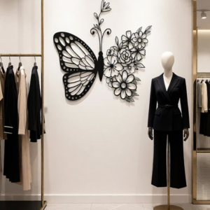 Add elegance, beauty, and artistic charm to your interiors with the Butterfly & Floral CNC Metal Wall Art. This graceful design features a delicately detailed butterfly paired with blooming floral patterns, symbolizing transformation, growth, and natural harmony. Its refined line-art style creates a soft yet striking visual statement for modern living spaces. Crafted using advanced CNC laser cutting technology, every wing, petal, and curve is precisely cut to achieve a clean and sophisticated finish. Made from high-quality metal and coated with a durable matte black powder finish, this wall art offers long-lasting durability while maintaining its elegant appearance. The open, airy design allows light and shadows to interact beautifully with the wall, adding depth without overwhelming the space. Whether displayed in a living room, bedroom, hallway, or creative corner, this artwork brings a calm, uplifting atmosphere and a touch of nature-inspired luxury. Perfect for those who love floral décor with a modern twist, this CNC metal butterfly wall art complements minimalist, contemporary, and artistic interior styles effortlessly.