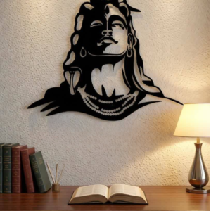 Bring spiritual depth and powerful artistic expression into your space with this Lord Shiva Metal Wall Art. Featuring a striking silhouette of Shiva’s serene face, adorned with symbolic elements such as flowing hair, crescent moon, and sacred ornaments, this artwork represents peace, strength, and divine consciousness. The bold yet minimalist design creates a calming presence while making a strong visual statement. Expertly crafted from high-quality metal, this wall art is precision cut to highlight fine facial details and smooth contours. The matte black powder-coated finish enhances its modern appeal while ensuring durability and long-lasting beauty with minimal maintenance. The clean silhouette design allows it to stand out beautifully against light-colored walls. Perfect for meditation rooms, living spaces, yoga studios, or spiritual corners, this artwork blends devotion with contemporary décor. It harmonizes effortlessly with modern, minimalist, and spiritual interior styles, adding both meaning and elegance to your environment. Designed for easy wall mounting, this piece transforms empty walls into a focal point of calm and inspiration. Whether placed in a personal prayer area or as a statement décor piece, it brings balance, serenity, and artistic sophistication to any space.