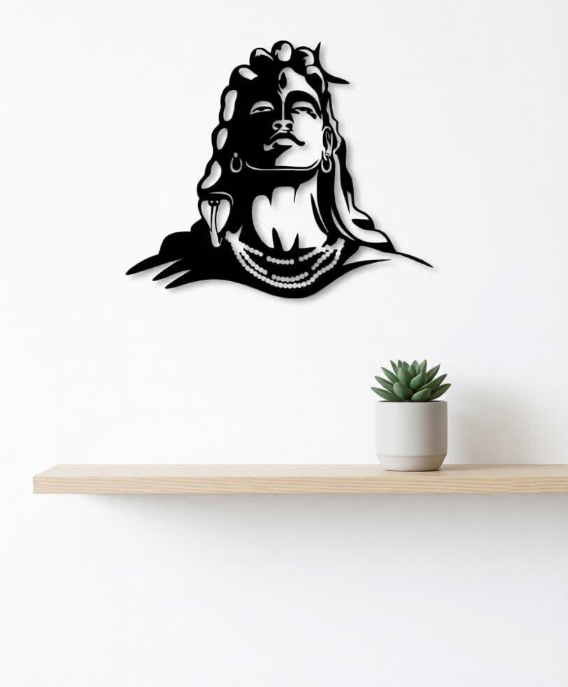 Bring spiritual depth and powerful artistic expression into your space with this Lord Shiva Metal Wall Art. Featuring a striking silhouette of Shiva’s serene face, adorned with symbolic elements such as flowing hair, crescent moon, and sacred ornaments, this artwork represents peace, strength, and divine consciousness. The bold yet minimalist design creates a calming presence while making a strong visual statement. Expertly crafted from high-quality metal, this wall art is precision cut to highlight fine facial details and smooth contours. The matte black powder-coated finish enhances its modern appeal while ensuring durability and long-lasting beauty with minimal maintenance. The clean silhouette design allows it to stand out beautifully against light-colored walls. Perfect for meditation rooms, living spaces, yoga studios, or spiritual corners, this artwork blends devotion with contemporary décor. It harmonizes effortlessly with modern, minimalist, and spiritual interior styles, adding both meaning and elegance to your environment. Designed for easy wall mounting, this piece transforms empty walls into a focal point of calm and inspiration. Whether placed in a personal prayer area or as a statement décor piece, it brings balance, serenity, and artistic sophistication to any space.