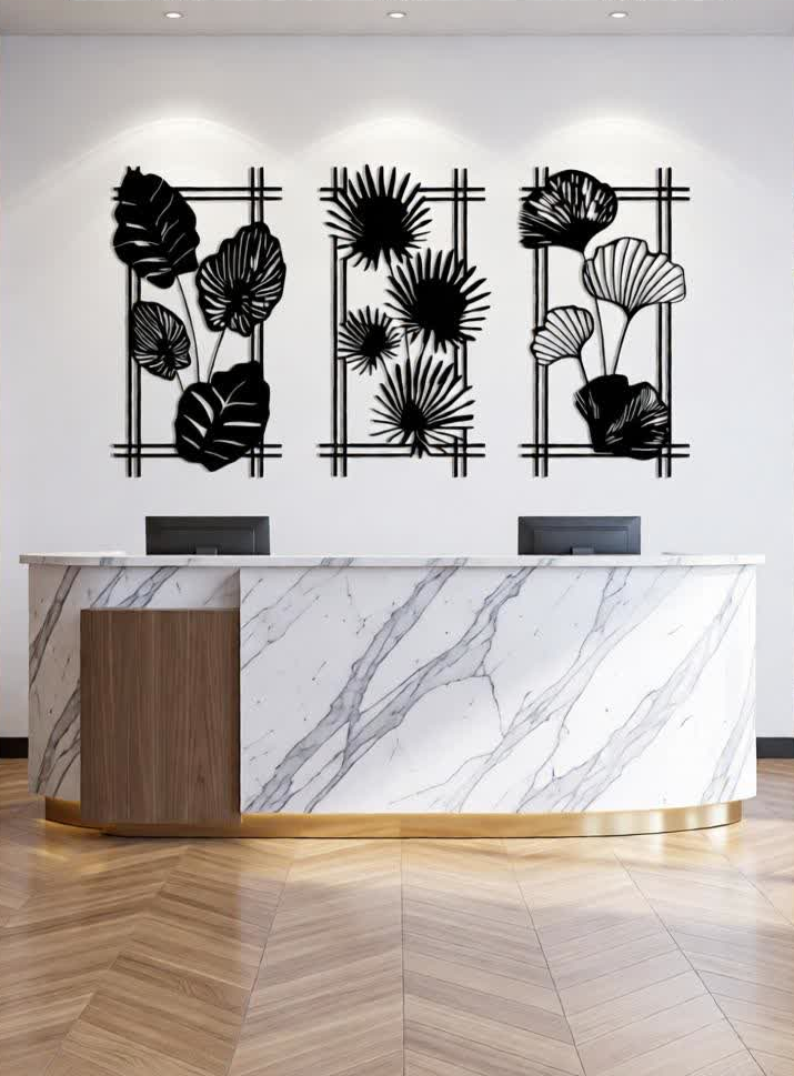 Enhance your interiors with this Modern Botanical CNC Metal Wall Art Set, featuring three beautifully designed panels inspired by tropical foliage. Each panel showcases unique leaf patterns framed in a clean geometric layout, creating a balanced and contemporary wall décor statement. Expertly crafted using precision CNC laser cutting technology, every detail is sharp and well-defined. The matte black powder-coated finish adds elegance and durability, making this set a perfect choice for modern homes, offices, lounges, and designer interiors.