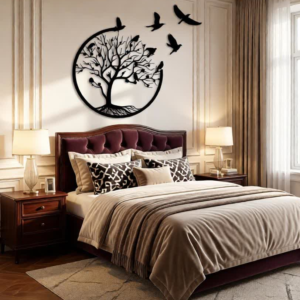 Create a serene and elegant focal point in your space with this Tree of Life with Flying Birds Metal Wall Art. Designed to symbolize growth, harmony, and freedom, this stunning artwork features a beautifully detailed tree enclosed within a circular frame, with birds gracefully flying outward to add movement and visual flow. The balanced composition brings a sense of calm and sophistication to any interior. Crafted from high-quality metal, this wall art is precision cut to capture fine branch details and smooth silhouettes. The matte black powder-coated finish enhances its modern appeal while ensuring durability and long-lasting beauty with minimal maintenance. The contrast between the bold metal design and light-colored walls creates a striking yet soothing visual impact. Perfect for bedrooms, living rooms, lounges, and feature walls, this artwork blends effortlessly with modern, luxury, and contemporary décor styles. Positioned above a bed, sofa, or console table, it transforms empty wall space into an expressive and meaningful design statement. The circular form represents unity and balance, while the birds in flight evoke a sense of freedom and tranquility. Designed for easy wall mounting, this piece offers a clean, floating appearance that enhances the overall ambiance of the room without overpowering it. Whether used in a residential or upscale interior setting, it adds depth, warmth, and artistic charm to your décor.