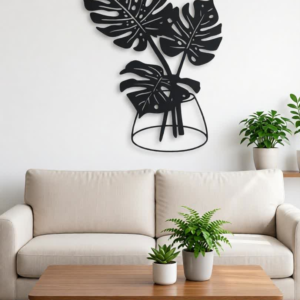 Bring a modern botanical vibe to your space with this Elegant Monstera Leaf CNC Metal Wall Art. Designed with beautifully detailed tropical leaves arranged in a stylish vase silhouette, this wall décor adds a fresh, artistic touch to contemporary and minimalist interiors. Crafted using precision laser cutting, the clean lines and intricate cut-outs create depth and visual interest. The matte black finish complements light-colored walls perfectly, making it an ideal décor piece for living rooms, hallways, dining areas, bedrooms, offices, and cafés.