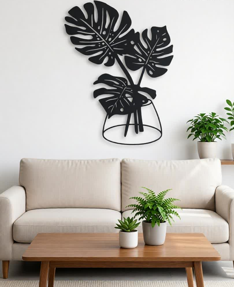Bring a modern botanical vibe to your space with this Elegant Monstera Leaf CNC Metal Wall Art. Designed with beautifully detailed tropical leaves arranged in a stylish vase silhouette, this wall décor adds a fresh, artistic touch to contemporary and minimalist interiors. Crafted using precision laser cutting, the clean lines and intricate cut-outs create depth and visual interest. The matte black finish complements light-colored walls perfectly, making it an ideal décor piece for living rooms, hallways, dining areas, bedrooms, offices, and cafés.