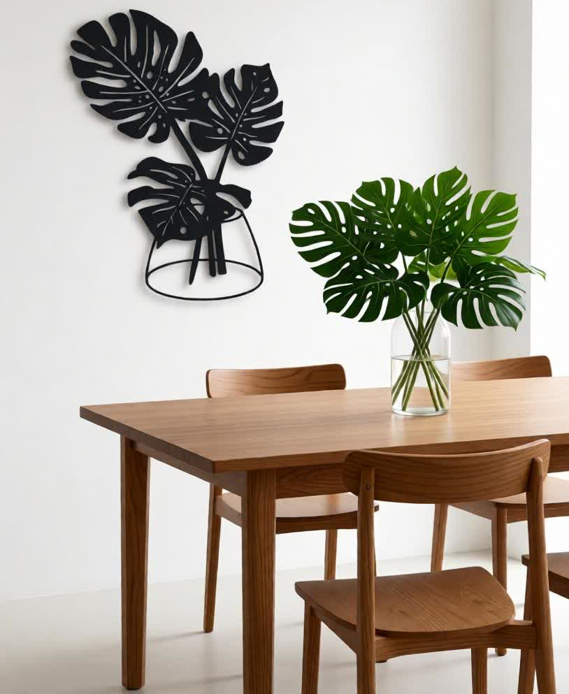 Bring a modern botanical vibe to your space with this Elegant Monstera Leaf CNC Metal Wall Art. Designed with beautifully detailed tropical leaves arranged in a stylish vase silhouette, this wall décor adds a fresh, artistic touch to contemporary and minimalist interiors. Crafted using precision laser cutting, the clean lines and intricate cut-outs create depth and visual interest. The matte black finish complements light-colored walls perfectly, making it an ideal décor piece for living rooms, hallways, dining areas, bedrooms, offices, and cafés.