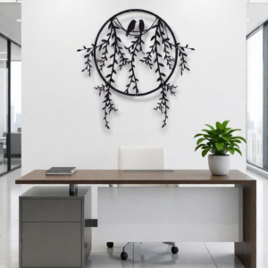 Add a touch of nature-inspired elegance to your interior with this Circular Birds & Hanging Branches Metal Wall Art. Designed to evoke calm, balance, and harmony, this artistic piece features two birds resting within a circular frame, surrounded by delicately cascading branches and leaves. The open, flowing design creates a soft visual movement that brings life and serenity to any wall. Expertly crafted from high-quality metal, this wall art is precision cut to ensure clean lines and smooth detailing throughout the design. The matte black powder-coated finish enhances its modern appeal while providing durability and resistance to wear, making it suitable for long-term indoor display with minimal maintenance. Perfect for offices, living rooms, bedrooms, reception areas, and creative workspaces, this artwork blends contemporary style with natural elements. The circular shape symbolizes unity and balance, while the botanical details add warmth and tranquility to modern, minimalist, and Scandinavian-inspired interiors. Designed for easy wall mounting, this piece transforms empty walls into elegant focal points without overwhelming the space. Whether displayed above a desk, sofa, or console table, it adds depth, character, and a refined artistic presence.
