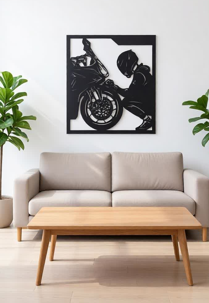 Bring power, passion, and precision to your walls with this Modern Biker CNC Metal Wall Art. Designed for motorcycle lovers and modern interiors, this artwork captures the raw emotion of a rider and machine in a bold, laser-cut silhouette. Crafted from high-quality metal sheet (1–2 mm thickness), the design is both lightweight and exceptionally strong. The precision laser-cut finish highlights fine details while maintaining a sharp, contemporary look. Finished in classic black powder coating, this wall art blends effortlessly with modern, industrial, and minimalist décor styles. Perfect as a statement piece for living rooms, offices, showrooms, garages, or man caves.