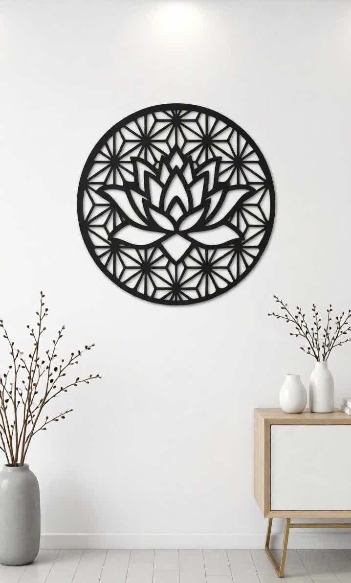 Elevate your interiors with this Elegant Lotus Metal Wall Art, a perfect fusion of spiritual symbolism and contemporary design. Featuring a beautifully crafted lotus flower surrounded by a detailed geometric mandala pattern, this artistic wall décor represents purity, peace, and positive energy. The intricate precision laser-cut metal design creates a striking visual effect that stands out beautifully against light or dark walls. The matte black finish enhances the depth and detailing of the lotus and geometric background, adding a modern and sophisticated touch to your living space. This wall décor is ideal for those who appreciate minimalist aesthetics combined with spiritual elegance, making it a perfect statement piece for modern homes and stylish interiors.