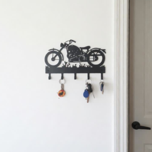Organize your essentials in style with this Motorcycle Metal Key Holder Wall Art. Designed with a detailed silhouette of a classic bike, this piece perfectly combines functionality with modern décor, making it a must-have for bike lovers.