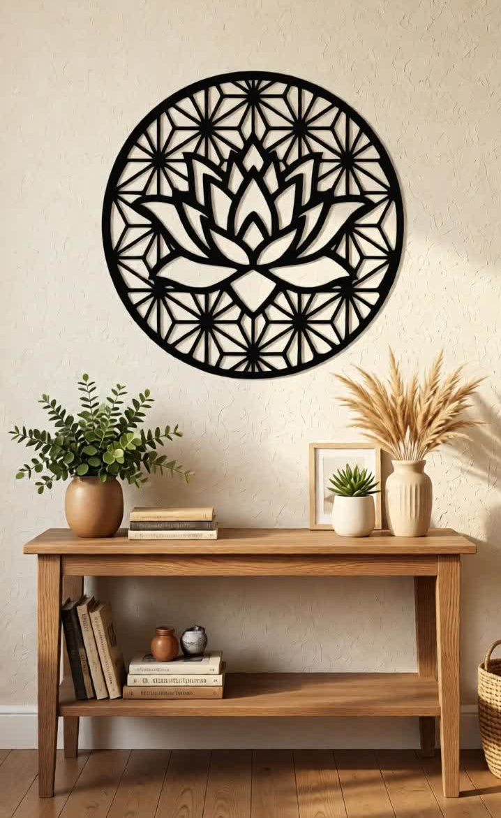 Elevate your interiors with this Elegant Lotus Metal Wall Art, a perfect fusion of spiritual symbolism and contemporary design. Featuring a beautifully crafted lotus flower surrounded by a detailed geometric mandala pattern, this artistic wall décor represents purity, peace, and positive energy. The intricate precision laser-cut metal design creates a striking visual effect that stands out beautifully against light or dark walls. The matte black finish enhances the depth and detailing of the lotus and geometric background, adding a modern and sophisticated touch to your living space. This wall décor is ideal for those who appreciate minimalist aesthetics combined with spiritual elegance, making it a perfect statement piece for modern homes and stylish interiors.