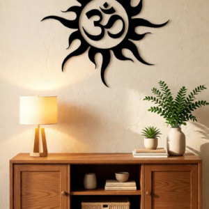 Bring positive energy and spiritual harmony into your home with this beautifully crafted Om Sun CNC Metal Wall Art. Designed with a powerful Om symbol at the center surrounded by sun rays, this artwork represents peace, strength, and divine energy. Made with high-precision CNC laser cutting from durable metal steel, this wall decor gives a modern yet spiritual touch to any interior space. The elegant design fits perfectly in living rooms, meditation areas, yoga studios, offices, temples, and entrances. Its minimalist black finish creates a strong visual impact on light-colored walls, making it a perfect statement piece for modern homes.