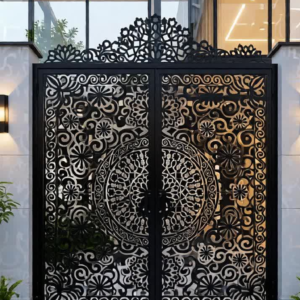 A luxury modern-oriental style home entrance at dusk featuring a complex, custom-fabricated CNC laser-cut black gate with gold-tone accents, a central medallion motif, horizontal Greek Key friezes, and traditional black ironwork cresting.
