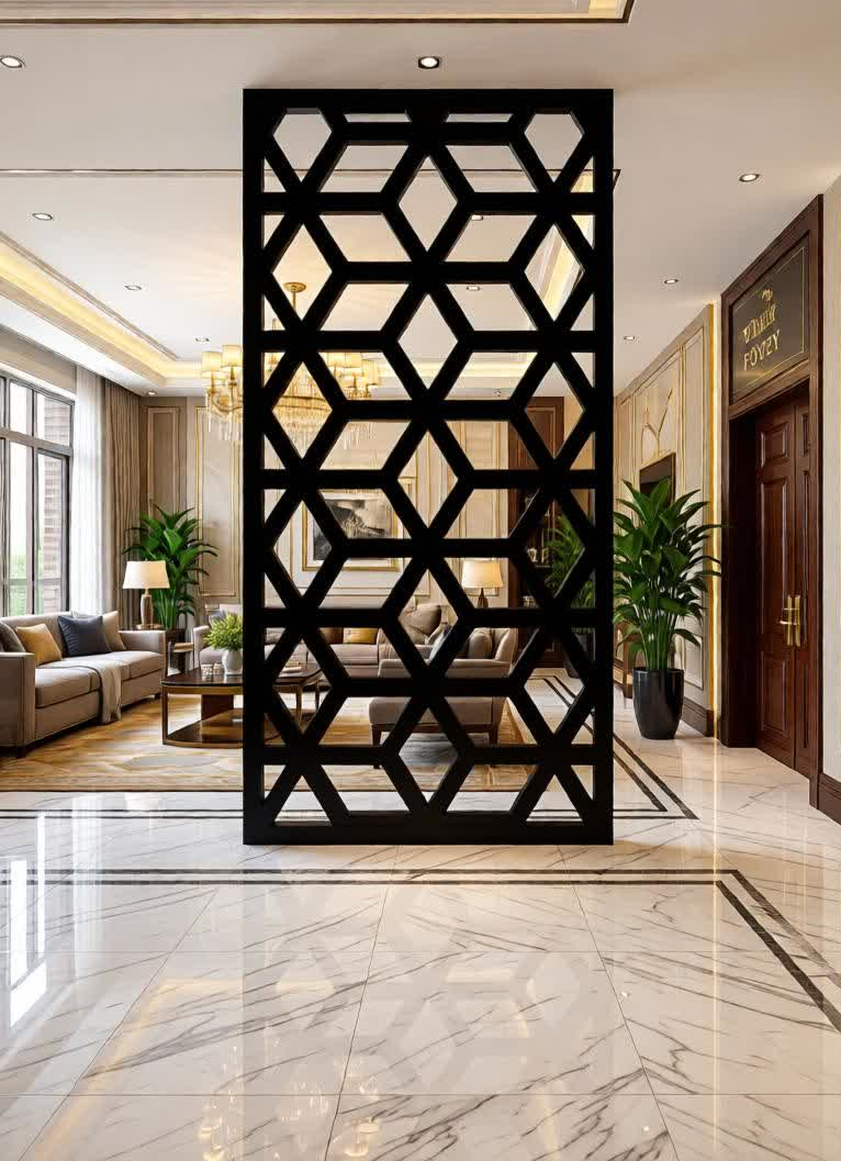 Upgrade your interior design with this Geometric CNC Laser Cut Jali Partition Panel, a perfect blend of modern aesthetics and functional space division. Designed with a stylish hexagon geometric pattern, this decorative partition adds a luxurious and contemporary look while maintaining openness and airflow within your space. It is an ideal solution for creating elegant separation without blocking light or visibility. Crafted using high-precision CNC laser cutting technology, this partition panel features sharp edges, clean detailing, and a premium finish that enhances any modern interior. The symmetrical geometric pattern creates a visually appealing structure that complements both minimalist and luxury décor styles. Whether used as a room divider, decorative screen, or wall accent, it instantly elevates the ambiance of your home or workspace. Made from high-quality durable metal, this jali partition is strong, long-lasting, and resistant to bending or wear. The sleek matte finish ensures a sophisticated appearance while blending seamlessly with marble floors, wooden furniture, and modern lighting setups. It can also be customized in different colors and finishes to match your interior theme.